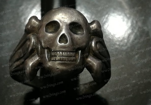 Big massive silver skull ring